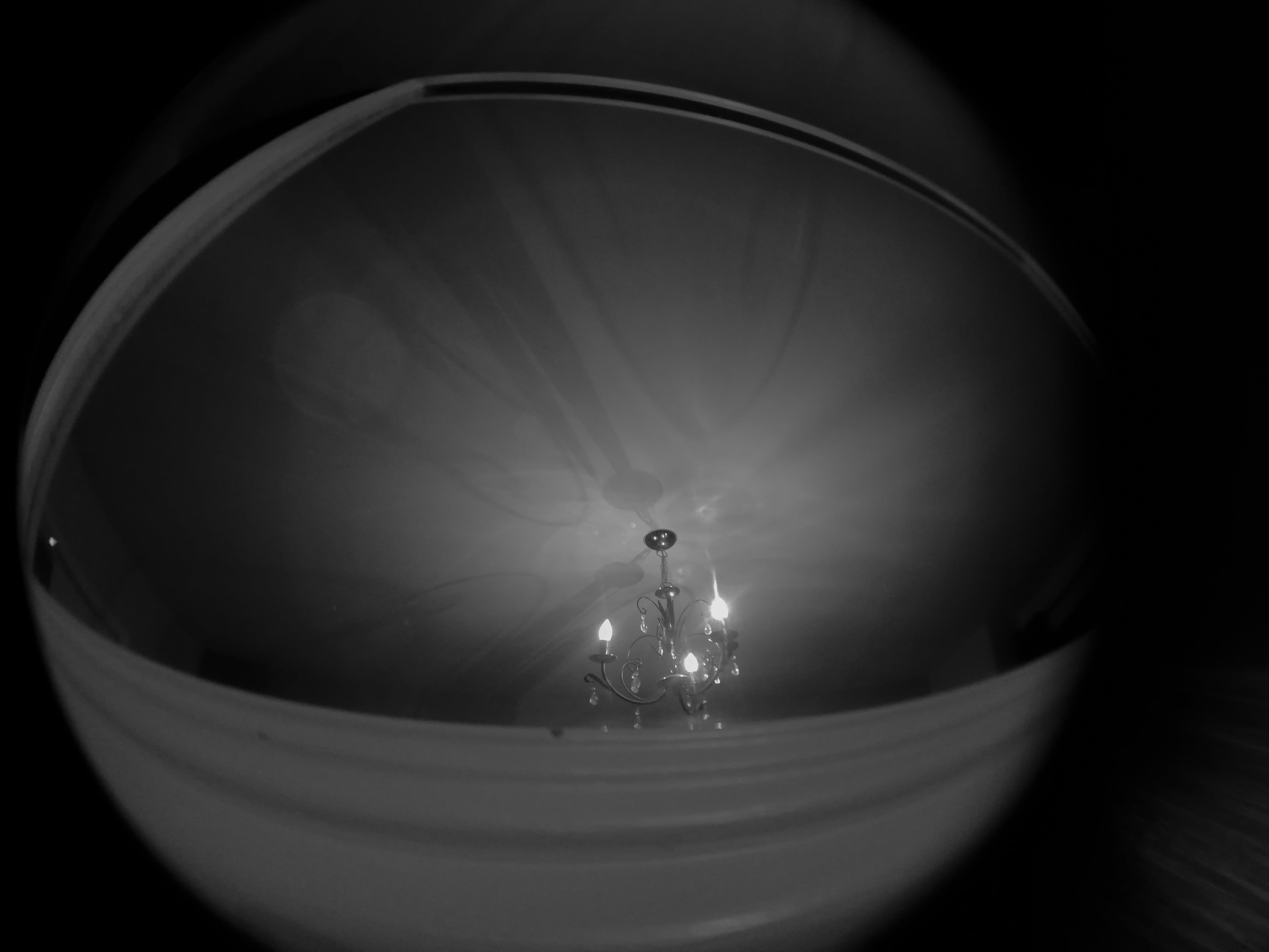 This is a black and white shot of the chandelier in my sitting room reflecting off of a wall mirror